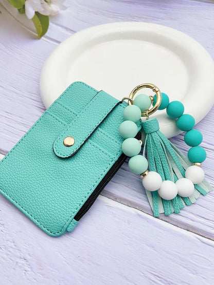 MADELYN™ - Porte-clés tendance et polyvalent avec perles et pompon