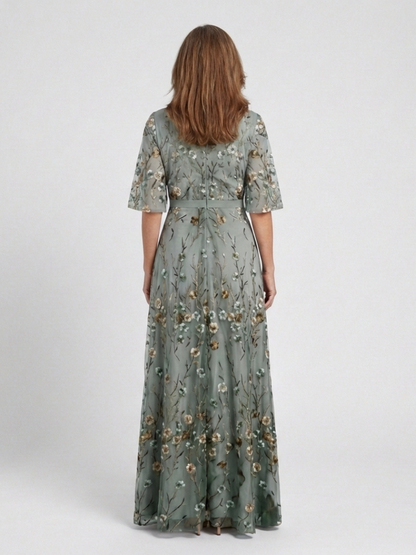 Evadne | Robe maxi à fleurs avec décolleté en V et manches courtes